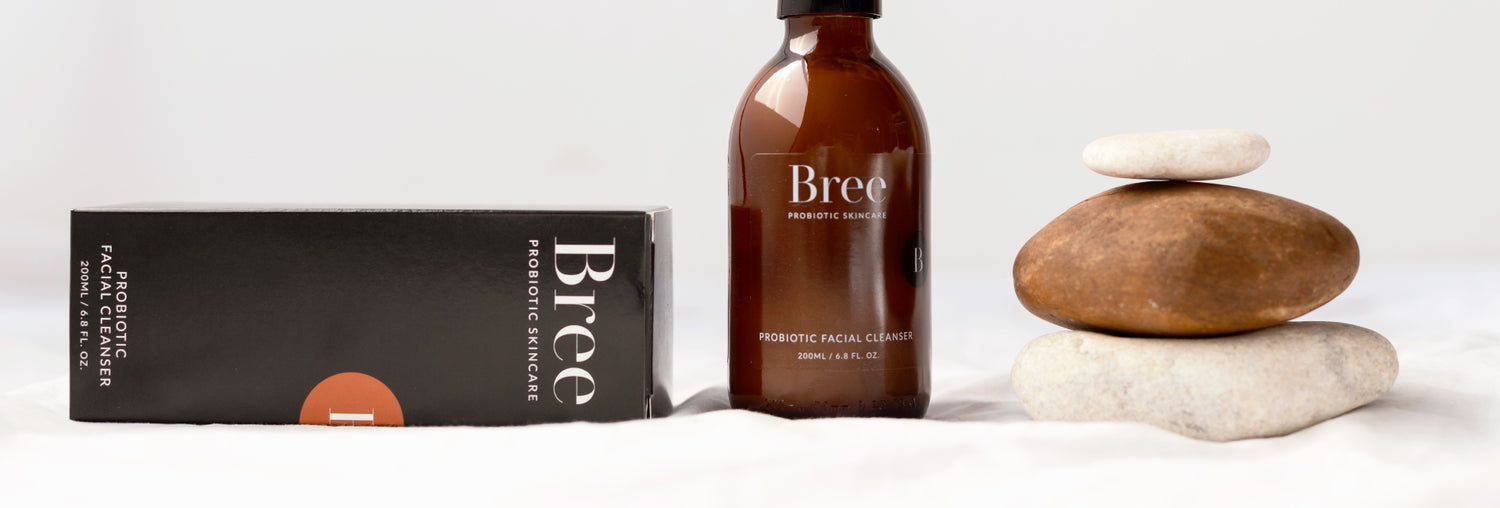 contact bree probiotic skincare slider image with facial cleanser and packaging